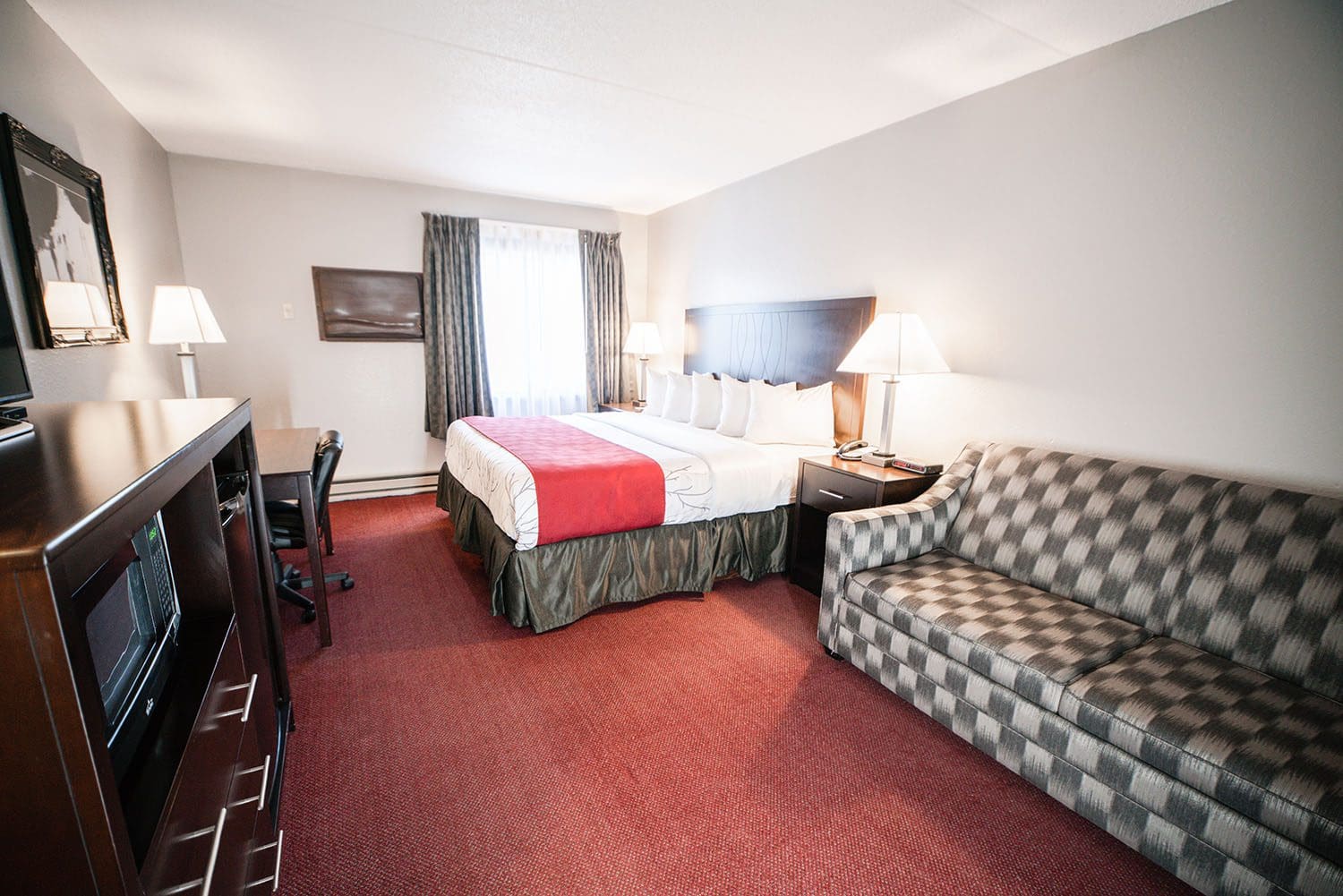 Hotel Room with 1 King bed, desk, microwave/fridge, sofa sleeper